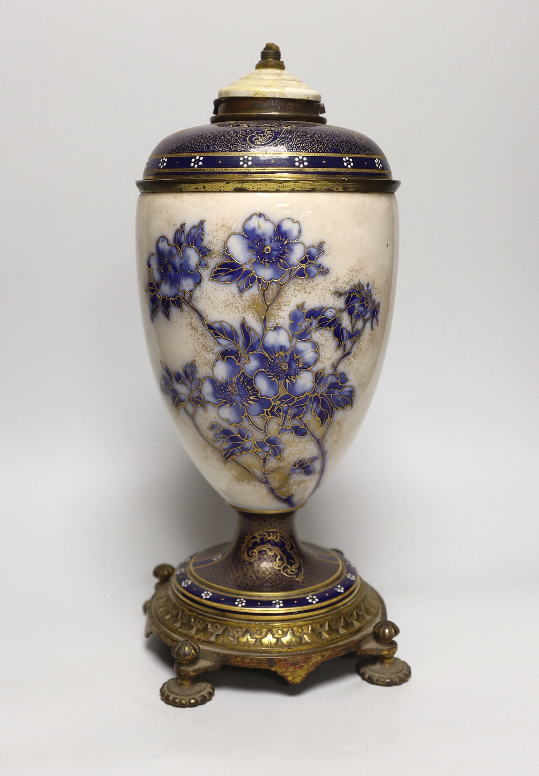 A Victorian gilt-metal mounted ceramic lamp base, 37cm tall